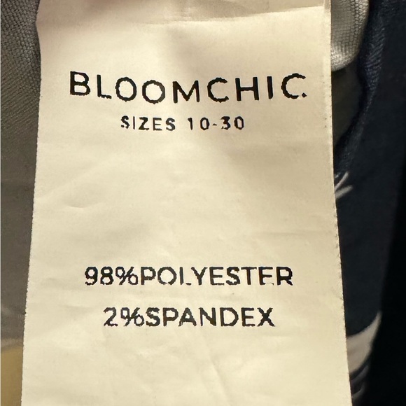 BloomChic NWOT navy floral top with 3/4 length sleeves with a ruffled cuff. 26 - Picture 8 of 8